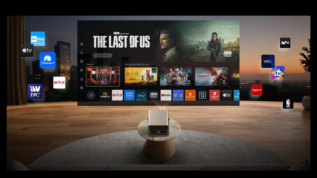 Projector displaying a VIDAA entertainment interface with programme tiles and app logos.