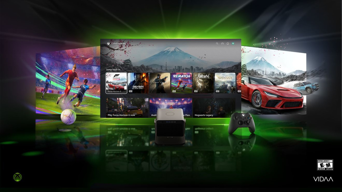 Xbox gaming interface surrounded by football and racing imagery, with the projector and a controller in front.