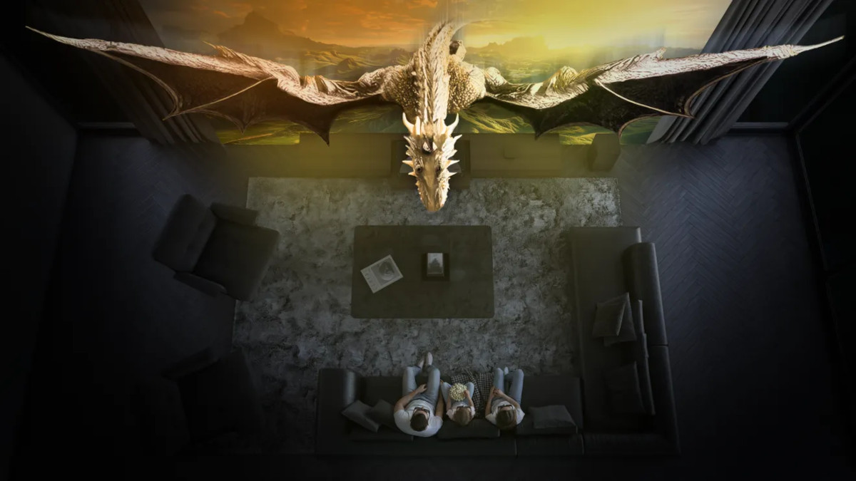 Overhead living-room illustration showing a dragon appearing to extend from a projection towards viewers wearing 3D glasses.