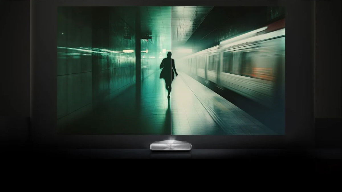 Hisense PX4 Pro projecting a dark green station scene with a silhouetted figure beside a moving train.